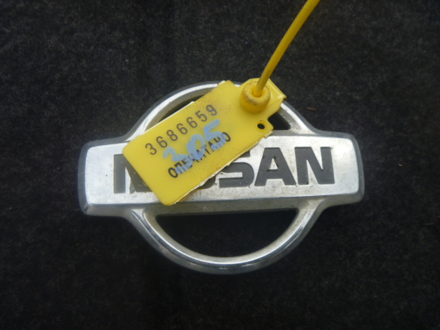 Эмблема
 Nissan
 March
 2001 г.в.,
                                кузов: ANK11; двигатель: CGA3DE;